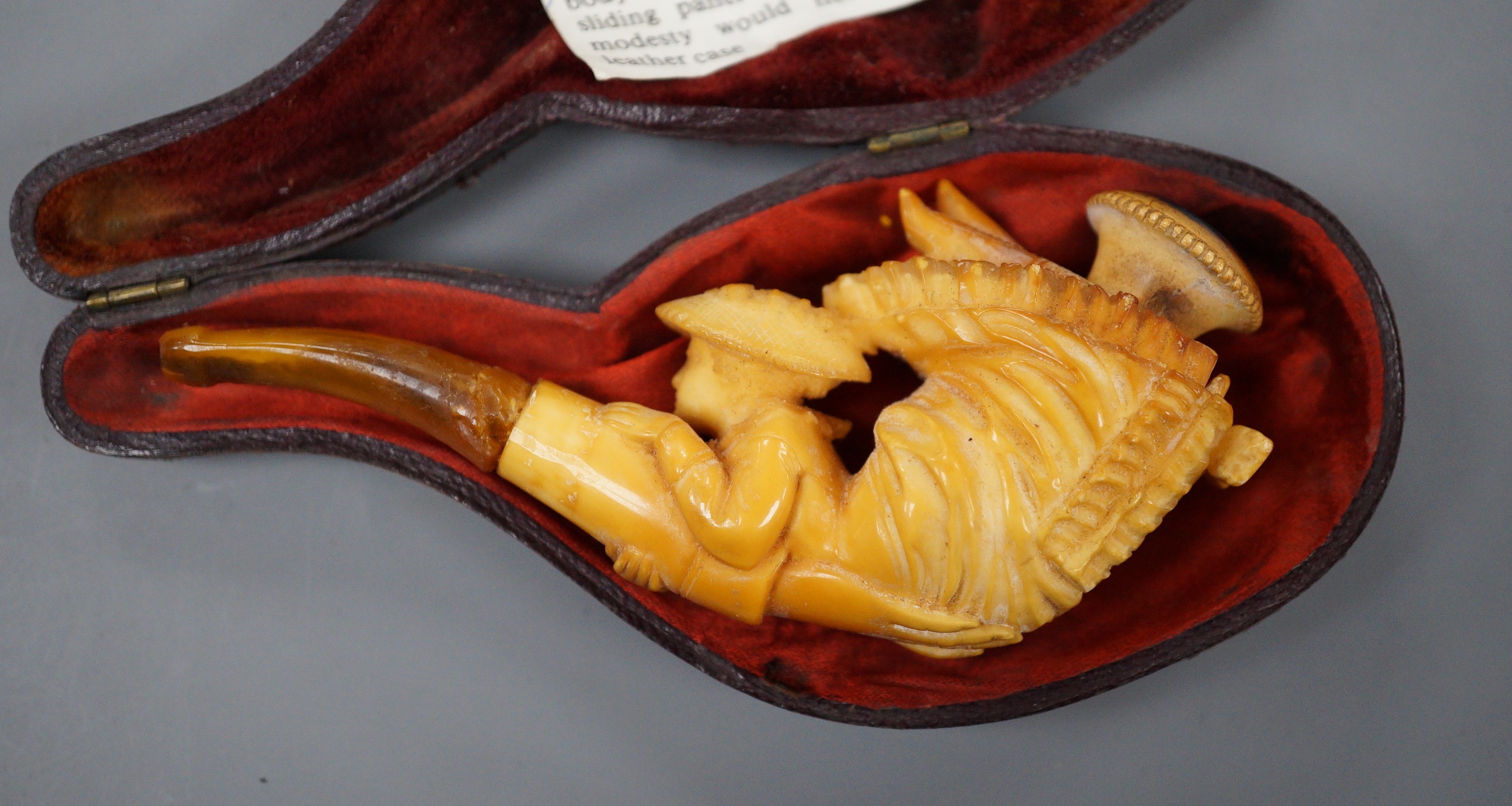 A Victorian erotic meerschaum pipe, 10.5 cm long, cased